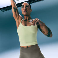 EnhanceLift™ Seamless Strappy Racer Tank Top with Built in Bra Shelf with Grey Logo | Pastel Yellow