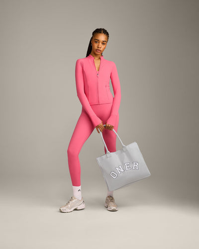 UnifiedMove™ Pocket Jacket with Reflective Logo | Hot Girl Pink