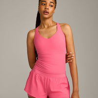 UnifiedMove™ V Neck Cross Back Vest with Reflective Logo | Hot Girl Pink