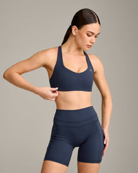 EasyLift™ Cross Back Sports Bra with Grey Logo | True Blue
