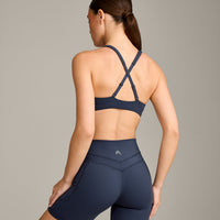EasyLift™ Cross Back Sports Bra with Grey Logo | True Blue