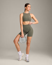 EasyLift™ High Neck Sports Bra with Grey Logo | Alpine Green