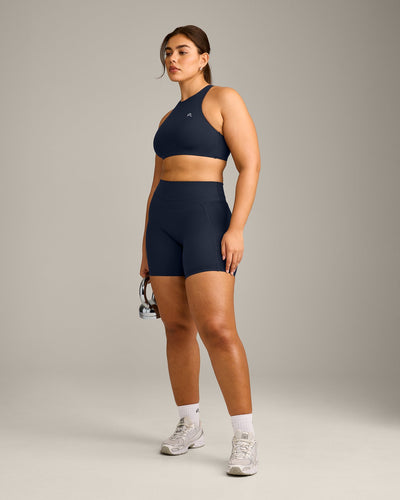 EasyLift™ High Neck Sports Bra with Grey Logo | True Blue