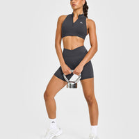EasyLift™ Zip High Neck Sports Bra with White Logo | Coal
