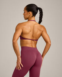 EnhanceLift™ Seamless Minimal Halter Neck Bralette with Grey Logo | Burnt Maroon