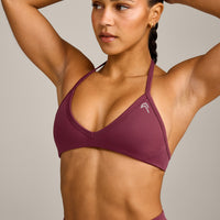 EnhanceLift™ Seamless Minimal Halter Neck Bralette with Grey Logo | Burnt Maroon