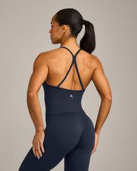 EnhanceLift™ Seamless Strappy Racer Vest with Built in Bra Shelf with Grey Logo | True Blue