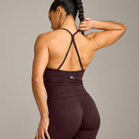 EnhanceLift™ Seamless Strappy Racer Vest with Built in Bra Shelf with Grey Logo | Plum Brown