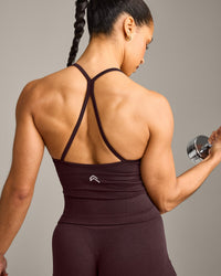 EnhanceLift™ Seamless Strappy Racer Vest with Built in Bra Shelf with Grey Logo | Plum Brown