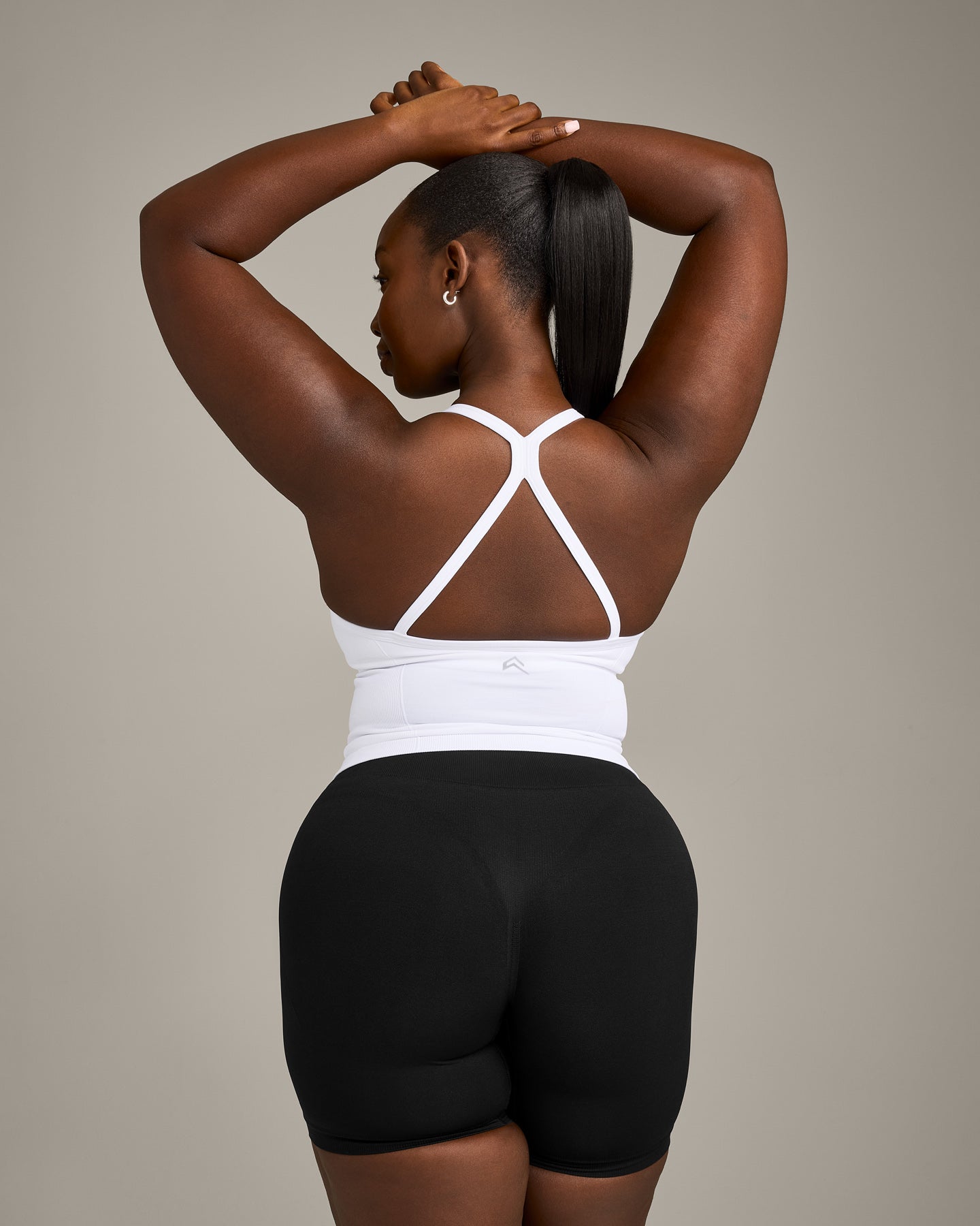 EnhanceLift™ Seamless Strappy Racer Vest with Built in Bra Shelf with Grey Logo | White