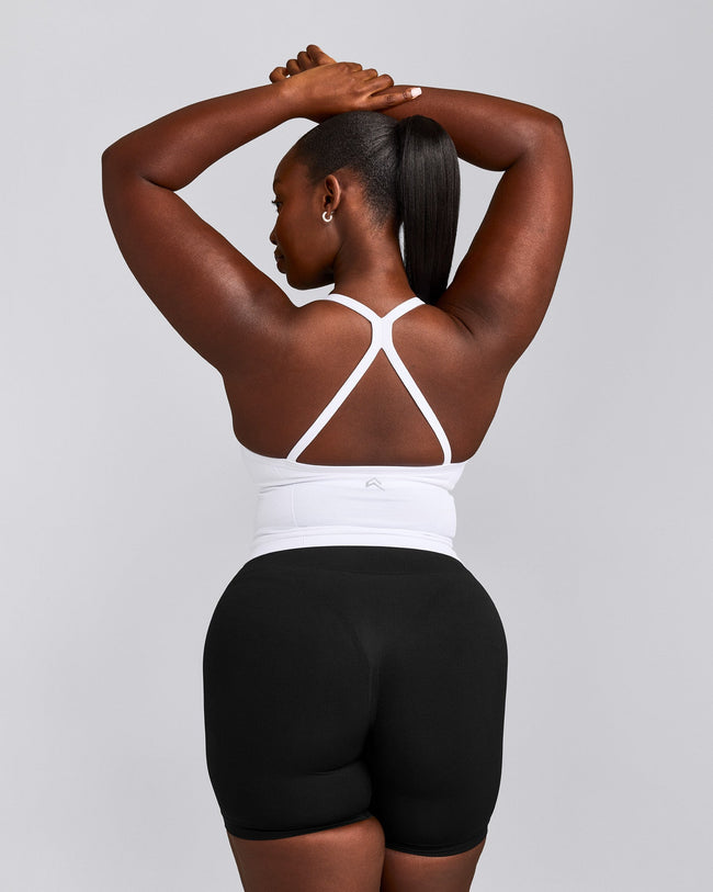 EnhanceLift™ Seamless Strappy Racer Tank Top with Built in Bra Shelf with Grey Logo | White