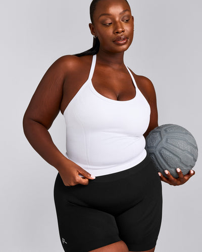 EnhanceLift™ Seamless Strappy Racer Tank Top with Built in Bra Shelf with Grey Logo | White