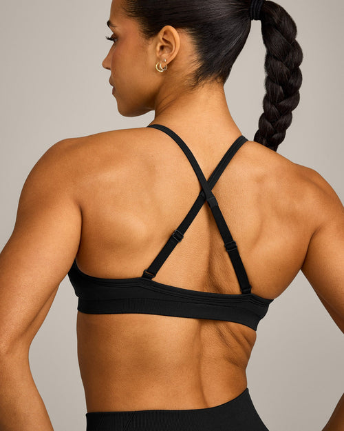 EnhanceLift™ Seamless Strappy Sports Bra with Grey Logo | Black