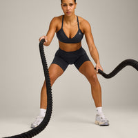 EnhanceLift™ Seamless Strappy Sports Bra with Grey Logo | Coal