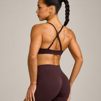 EnhanceLift™ Seamless Strappy Sports Bra with Grey Logo | Plum Brown