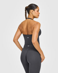 SoftMotion™ Halter Neck Mid Vest with Built in Bra Shelf with White Logo | Coal