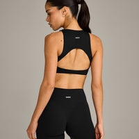 SoftMotion™ High Neck Sports Bra with Grey Logo | Black