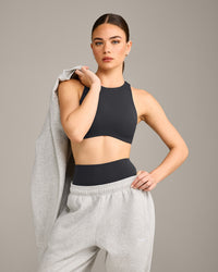 SoftMotion™ High Neck Sports Bra with Grey Logo | Coal