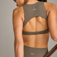 SoftMotion™ High Neck Sports Bra with Grey Logo | Moss Brown