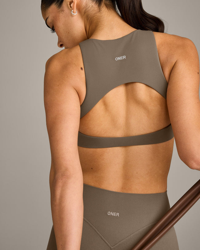 SoftMotion™ High Neck Sports Bra with Grey Logo | Moss Brown