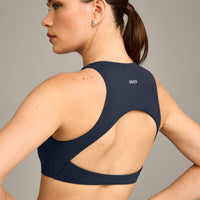 SoftMotion™ High Neck Sports Bra with Grey Logo | True Blue
