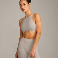 SoftMotion™ High Neck Sports Bra with White Logo | Warm Sand