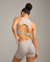 SoftMotion™ High Neck Sports Bra with White Logo | Warm Sand