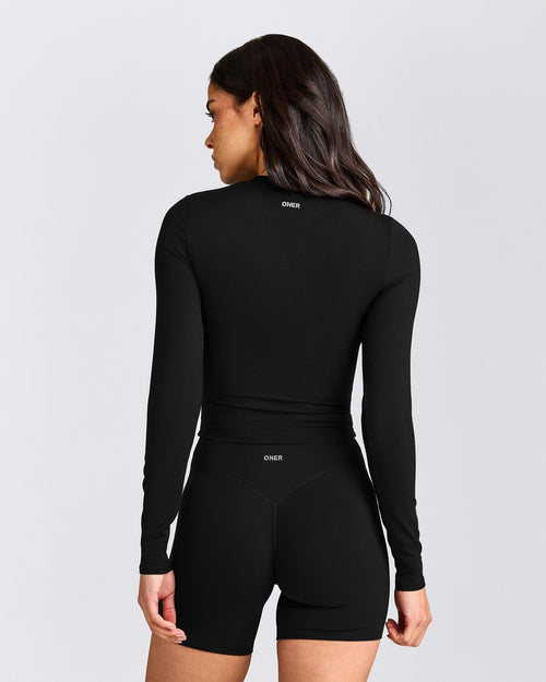 SoftMotion™ Long Sleeve Mid Top | Black