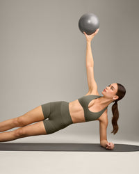 SoftMotion™ Minimal Halter Neck Bralette with Grey Logo | Alpine Green