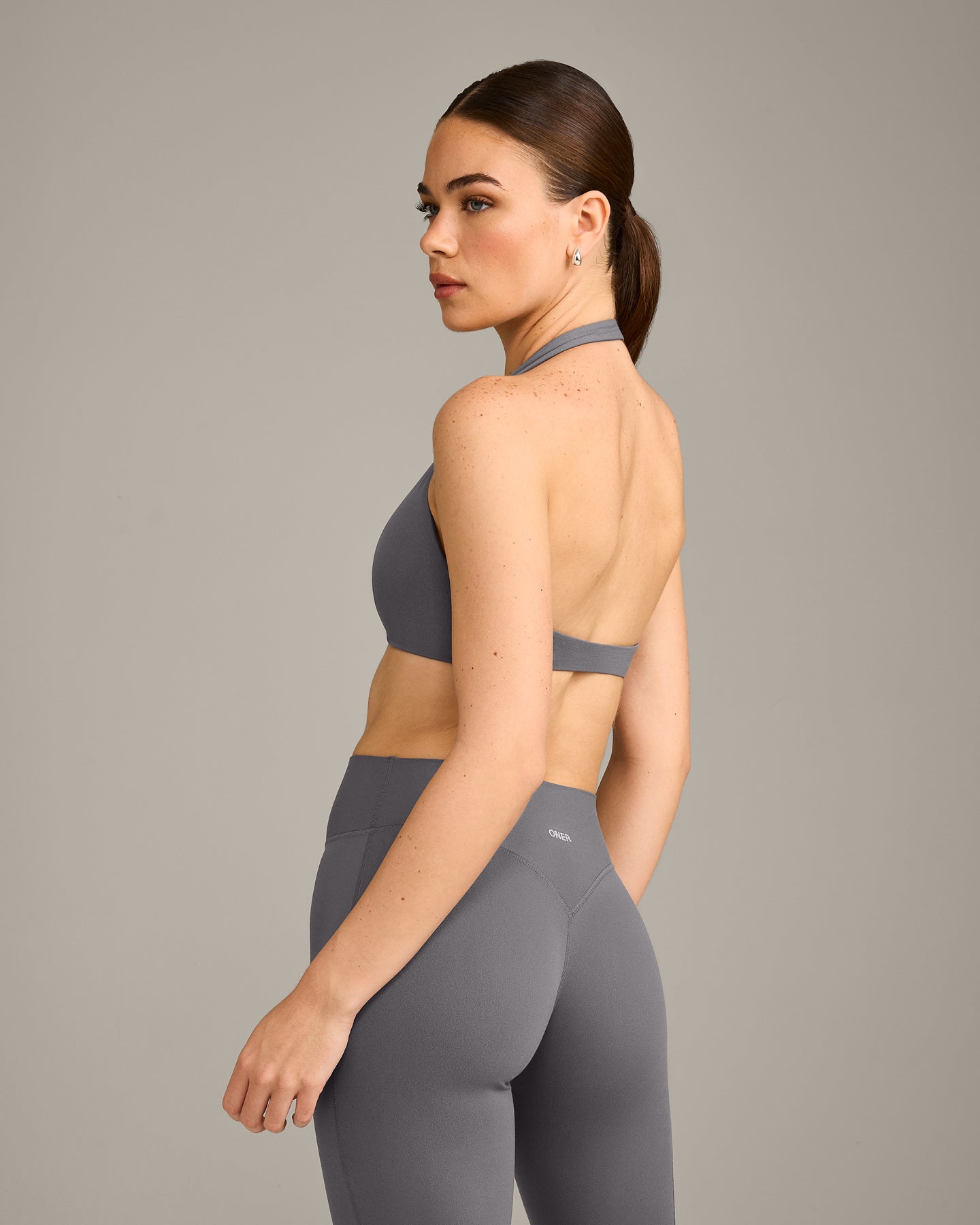 SoftMotion™ Minimal Halter Neck Bralette with Grey Logo | Ash Grey