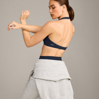 SoftMotion™ Minimal Halter Neck Bralette with Grey Logo | True Blue