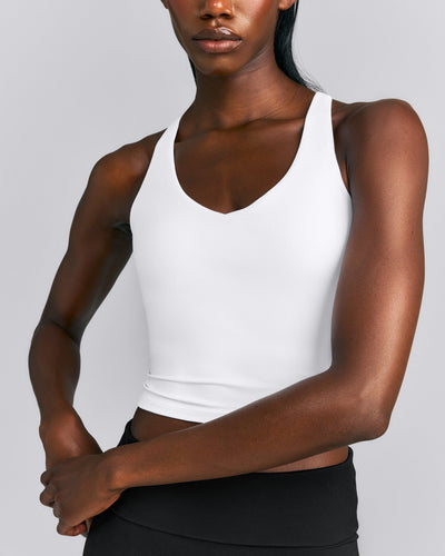 SoftMotion™ Racer Back Mid Tank Top with Built in Bra Shelf New Branding | White