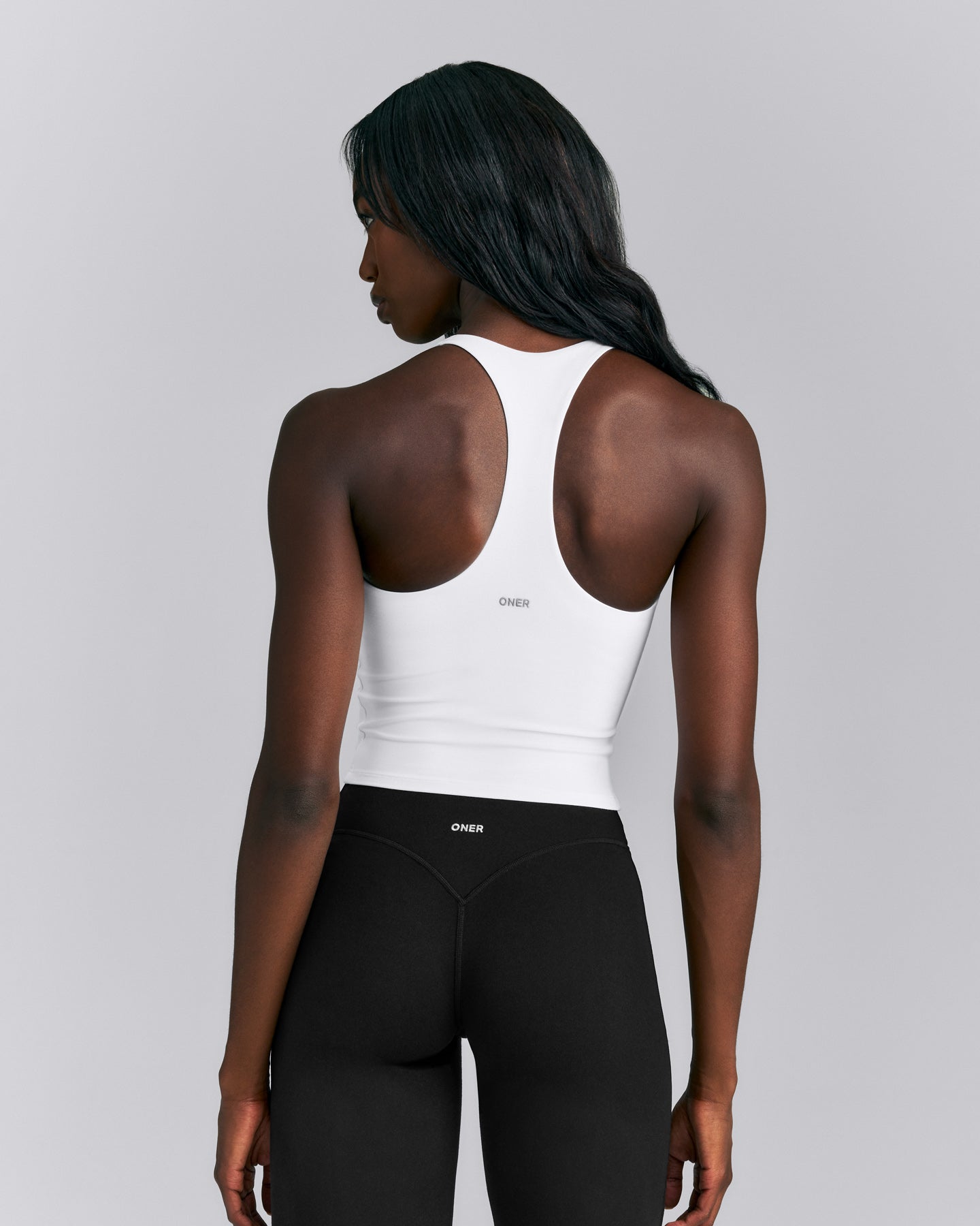 SoftMotion™ Racer Back Mid Tank Top with Built in Bra Shelf | White