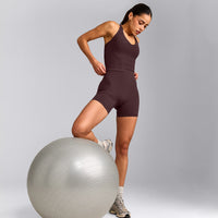 SoftMotion™ Racer Back Mid Tank Top with Built in Bra Shelf with Grey Logo | Plum Brown