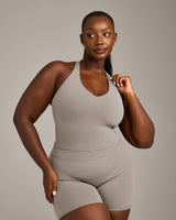 SoftMotion™ Racer Back Mid Vest with Built in Bra Shelf with White Logo | Warm Sand