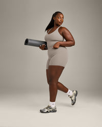 SoftMotion™ Racer Back Mid Vest with Built in Bra Shelf with White Logo | Warm Sand