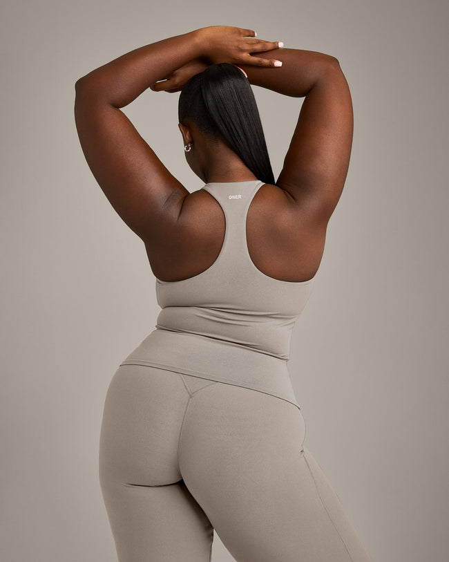 SoftMotion™ Racer Back Vest with Built in Bra Shelf with White Logo | Warm Sand