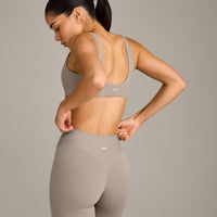 SoftMotion™ Scoop Back Bralette with White Logo | Warm Sand