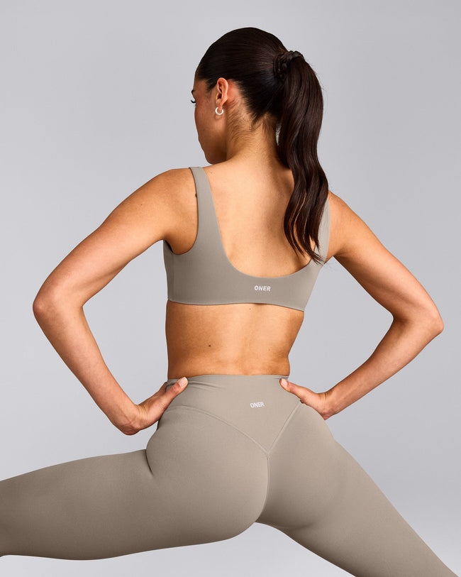 SoftMotion™ Scoop Back Bralette with White Logo | Warm Sand