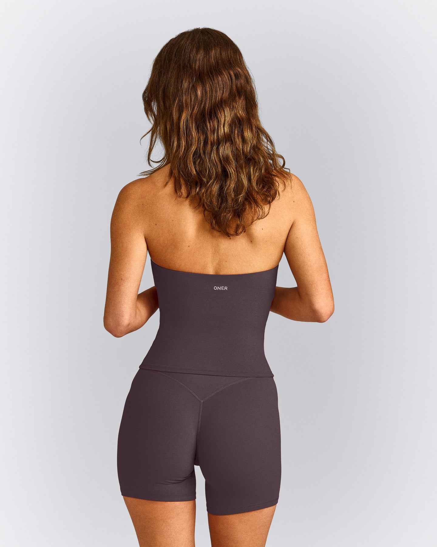 SoftMotion™ Strappy Halter Neck Mid Tank Top with Built in Bra Shelf with Grey Logo | Dark Umber Brown