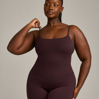 SoftMotion™ Strappy Mid Vest with Built in Bra Shelf with Grey Logo | Plum Brown