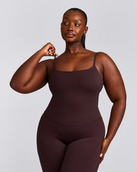 SoftMotion™ Strappy Mid Tank Top with Built in Bra Shelf with Grey Logo | Plum Brown