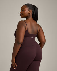 SoftMotion™ Strappy Mid Vest with Built in Bra Shelf with Grey Logo | Plum Brown