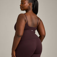 SoftMotion™ Strappy Mid Vest with Built in Bra Shelf with Grey Logo | Plum Brown