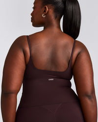 SoftMotion™ Strappy Mid Tank Top with Built in Bra Shelf with Grey Logo | Plum Brown