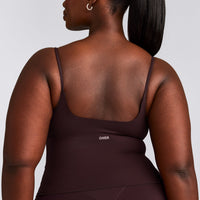 SoftMotion™ Strappy Mid Tank Top with Built in Bra Shelf with Grey Logo | Plum Brown