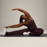 SoftMotion™ Strappy Mid Vest with Built in Bra Shelf with Grey Logo | Plum Brown