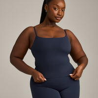 SoftMotion™ Strappy Mid Vest with Built in Bra Shelf with Grey Logo | True Blue