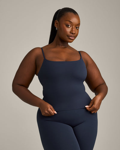 SoftMotion™ Strappy Mid Vest with Built in Bra Shelf with Grey Logo | True Blue