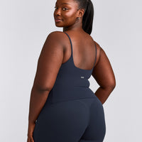 SoftMotion™ Strappy Mid Vest with Built in Bra Shelf with Grey Logo | True Blue